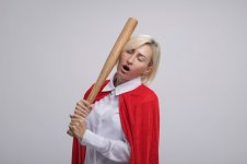 aching-middle-aged-blonde-superhero-woman-red-cape-beating-herself-head-with-baseball-bat-with...jpg